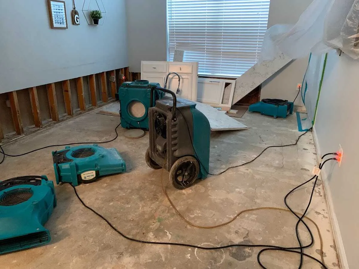 Dehumidifier in flood-cut room for Water Damage Restoration in Fort Leonard Wood